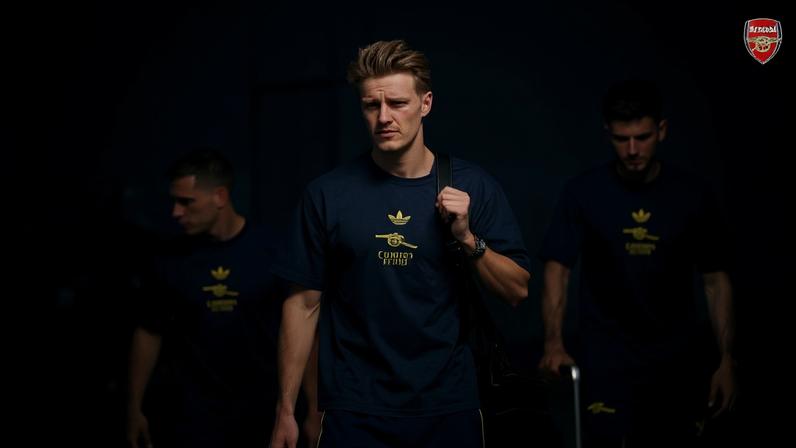 Jogadores do Arsenal embarcam no voo para Budapeste antes da grande final da Champions League.