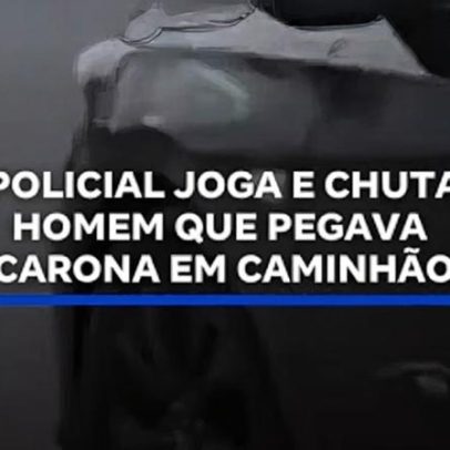 Policial é filmado jogando e chutando homem que pegava carona em caminhão