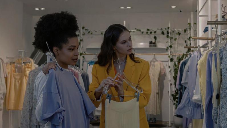 Shoppers at a clothing store