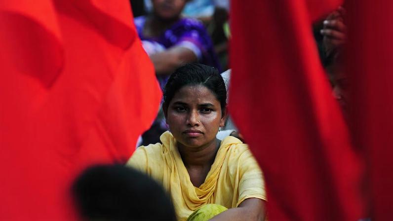 A Bangladeshi garment worker participates in a protest in Dhaka.
