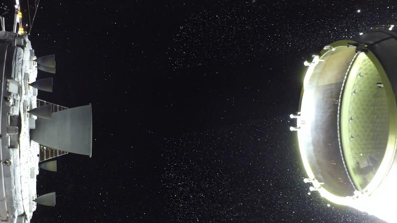 Two of the Artemis II CubeSats can be seen in the lower portion of the Orion stage adapter on the right side of the image.