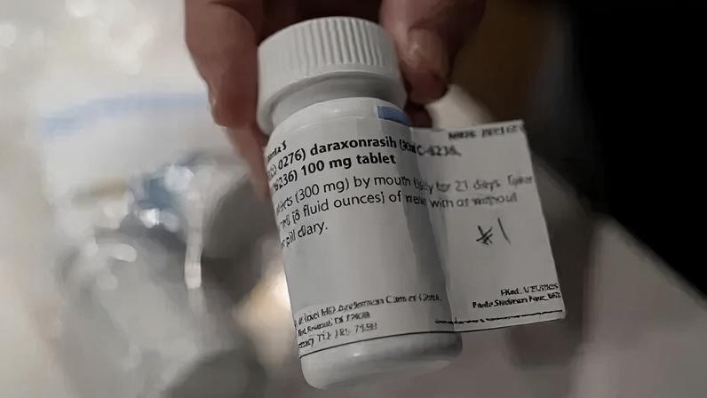 Reuters A pill bottle labelled daraxonrasib