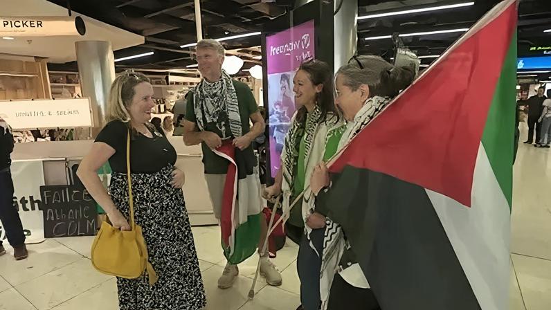 Supporters of the Global Sumud Flotilla members waiting at Dublin Airport