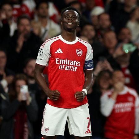 Bukayo Saka, atacante do Arsenal, celebra gol marcado sobre o Atlético de Madri, na Liga dos Campeões