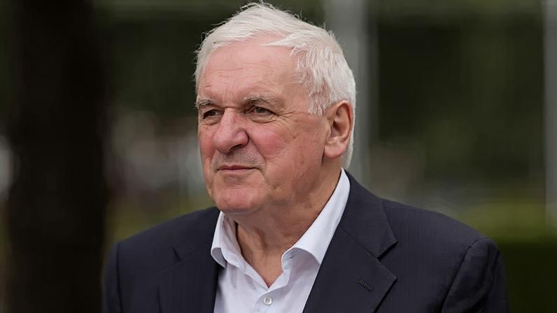 Bertie Ahern was challenged to state his views on immigration while canvassing voters