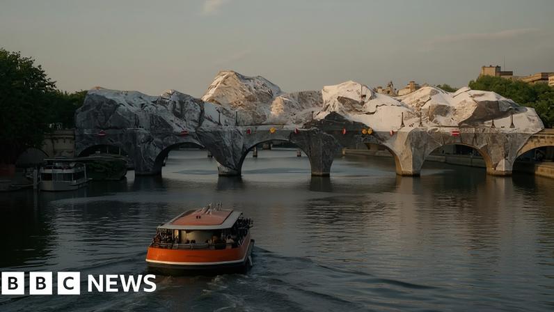 A giant 'cave' installation covers a French bridge spanning the river Seine