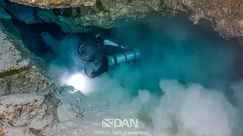 A member of the diving team searching for the bodies of the Italian divers