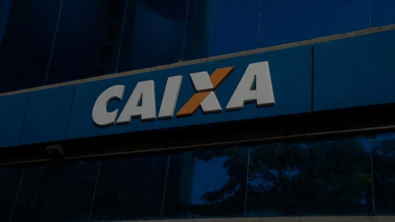 Imagem colorida da fachada de uma agência da Caixa Econômica Federal concurso edital - Metrópoles