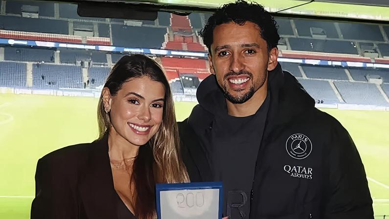Jogador de futebol Marquinhos e a esposa