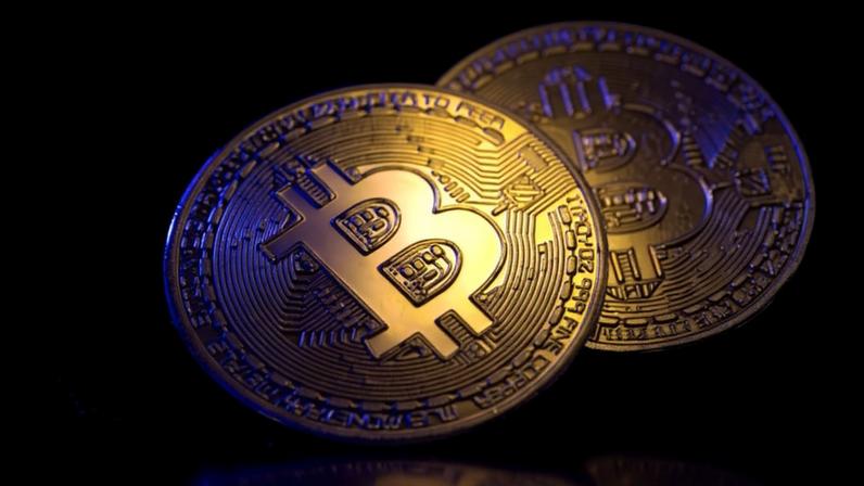 Bitcoin coin close-up on a black background. Finance concept. background with cryptocurrency. High quality photo
