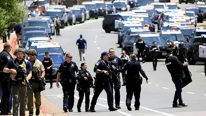 Getty Images Law enforcement officers escort people away from the Islamic Center of San Diego after reports of a shooting on May 18, 2026 in San Diego, CA.