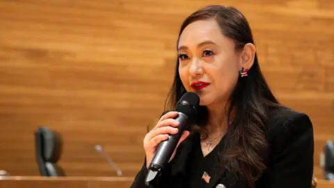 Eileen Wang pictured speaking earlier this year in Arcadia, California