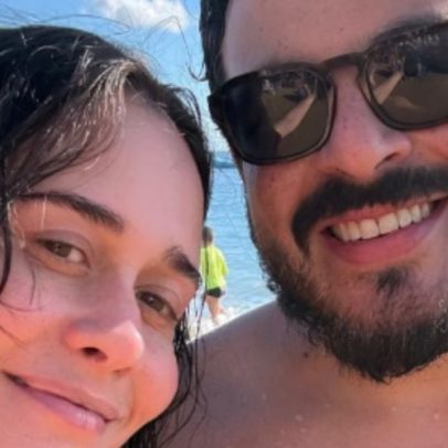 Alessandra Negrini é fotografada na praia com Luis Lobianco