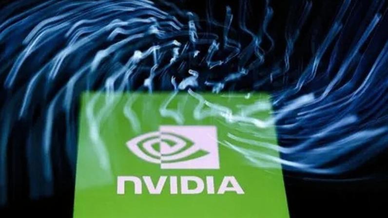NurPhoto via Getty Images A laptop keyboard and Nvidia logo displayed on a phone screen are seen in this multiple exposure illustration photo