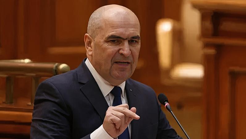 Bolojan has clashed with coalition partners over austerity measures