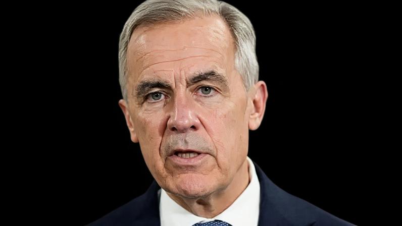 Reuters A close-up image of Mark Carney mid-speech. He has short grey and black hair and grey eyes.