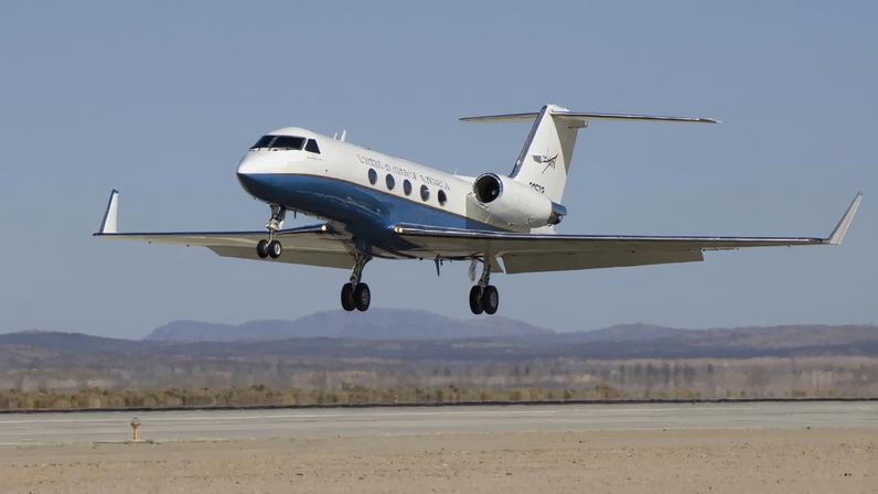 NASA’s C-20A research aircraft takes off from the Edwards Air Force Base runway on an envelope-expansion flight test with the unmanned aerial vehicle synthetic aperture radar pod.