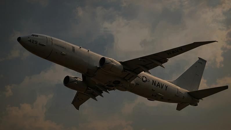 Getty Images A P-8 Poseidon in flight, with the BBC Verify logo superimposed next to it