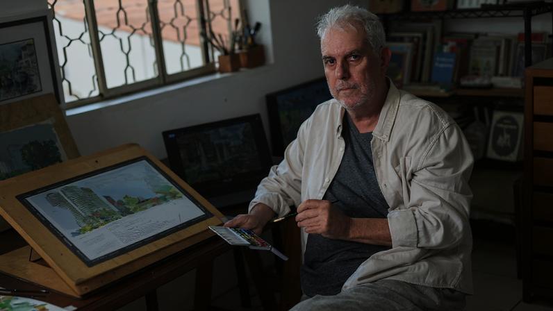 O aquarelista Wagner Bottaro, em seu ateliê no bairro Carlos Prates, retrata nos quadros em destaque o viaduto Santa Tereza e o Edifício Niemeyer