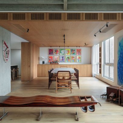 Apartamento de 123 m² prioriza unidade de materiais e integração social