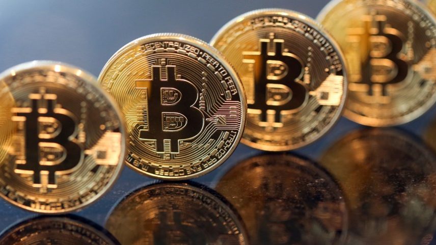 Bitcoin opera estável na faixa dos US$ 80 mil com inflação dos EUA e guerra no Irã no radar — Foto: Chris Ratcliffe/Bloomberg