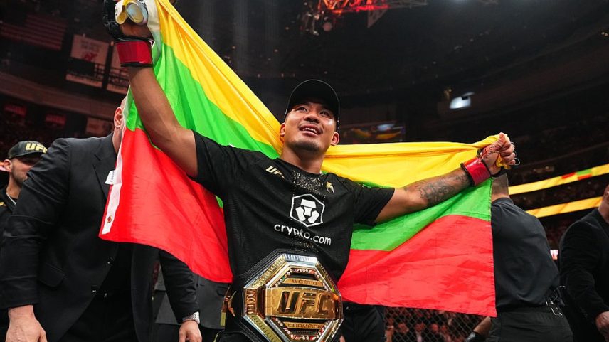 Joshua Van manteve o cinturão dos moscas no UFC 328 — Foto: Getty Images