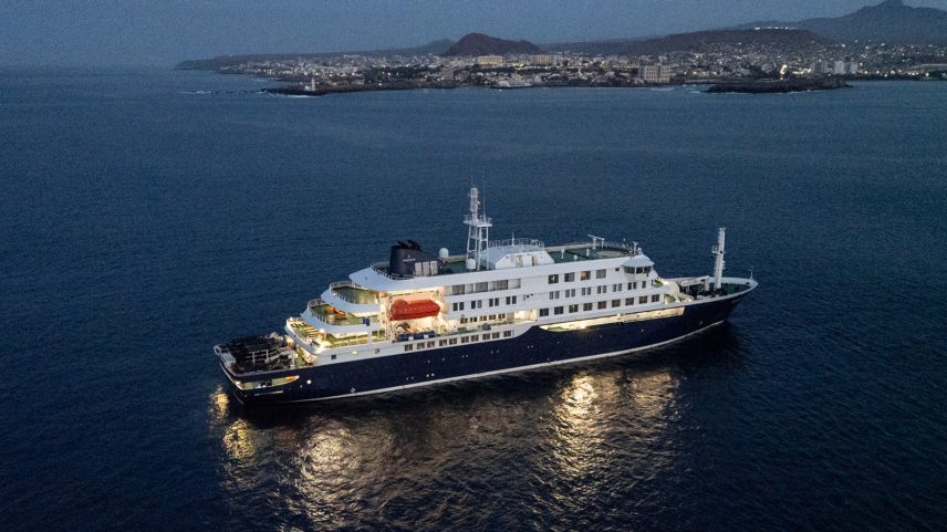 A general view of the cruise ship MV Hondius, while stationary off the port of Praia, the capital of Cape Verde, on May 6, 2026. Two seriously ill crew members on a cruise ship stricken by a deadly hantavirus outbreak will be evacuated via Cape Verde to the Netherlands, allowing the vessel to sail on to Spain's Canary Islands, the ship operator said on May 5, 2026. The MV Hondius has been at the centre of an international health scare since Saturday, when WHO was informed that the rare disease -- usually spread from infected rodents typically through urine, droppings and saliva -- was suspected of being behind the deaths of three of its passengers. As others fell ill, passengers and crew have been in isolation after Cape Verde authorities barred the ship from docking, and as health authorities scrambled to find a port that would take the Hondius.