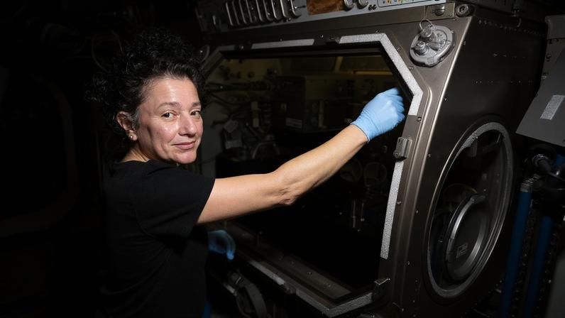 NASA astronaut and Expedition 74 flight engineer Jessica Meir configures research gear inside the Destiny laboratory module's Microgravity Science Glovebox aboard the International Space Station. Meir was exploring how weightlessness affects tiny particles floating in a gelatin-like substance, known as a colloidal solid. Results may lead to advanced manufacturing techniques leading to new medicines, better food textures, and improved personal care products on Earth and in space.