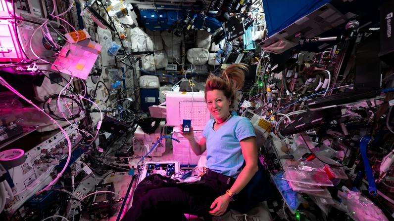 ESA astronaut Sophie Adenot shows off new scientific hardware recently delivered to the International Space Station aboard a SpaceX Dragon cargo spacecraft. The new research equipment aims to grow human bone cells potentially leading to advanced treatments for osteoporosis and improved bone‑healing therapies for patients.