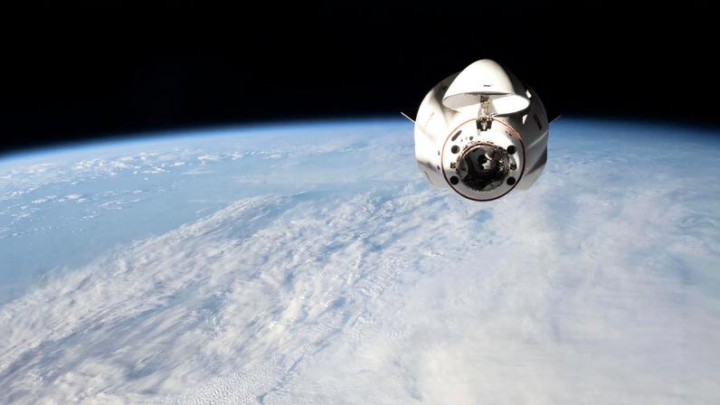 A SpaceX Dragon cargo spacecraft, with its nose cone open to reveal its docking mechanism, approaches the International Space Station carrying nearly 6,500 pounds of food, supplies, and equipment for the Expedition 74 crew. This mission marked SpaceX’s 34th commercial resupply services flight to the space station for NASA.