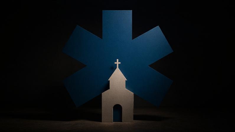 A hospital sign with a church on it.