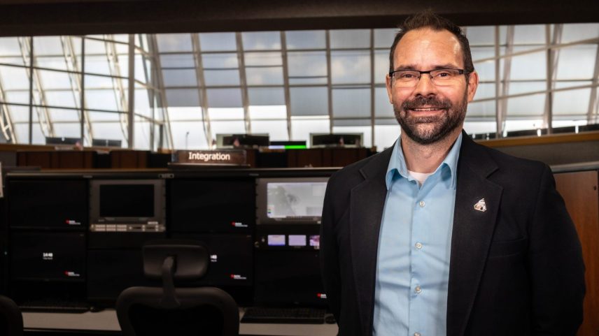 Portrait of NASA's Anton Kiriwas inside Firing Room 1 of the Launch Control Center at NASA's Kennedy Space Center in Florida