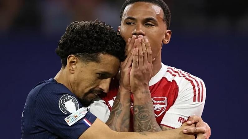 Marquinhos consola Gabriel Magalhães após final da Champions entre PSG e Arsenal
