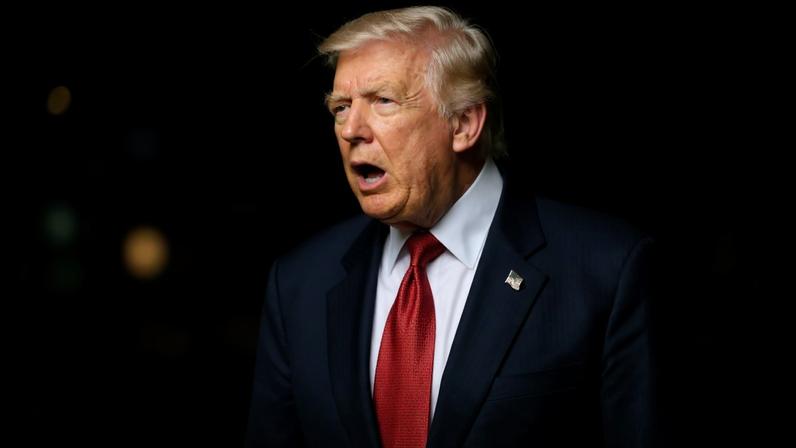 US President Donald Trump speaks to journalists as he makes his way to board Marine One before departing from the South Lawn of the White House in Washington, DC on May 8, 2026. Trump is traveling to Sterling, Virginia, where he will participate in a LIV Golf dinner. (Photo by Mandel NGAN / AFP)