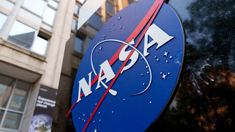 WASHINGTON, DC - JUNE 2: A NASA logo is displayed at the entrance to the Mary W. Jackson NASA Headquarters building on June 2, 2025 in Washington, DC. (Photo by Kevin Carter/Getty Images)