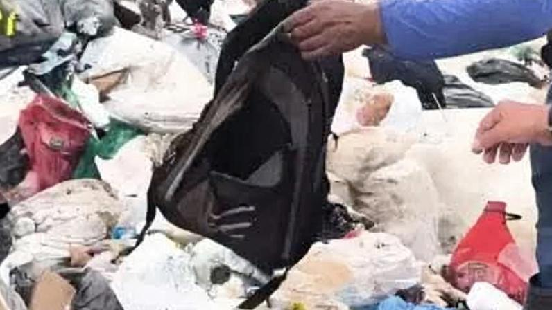Imagem colorida, recém nascido encontrado em meio a sacos de lixo- Metrópoles
