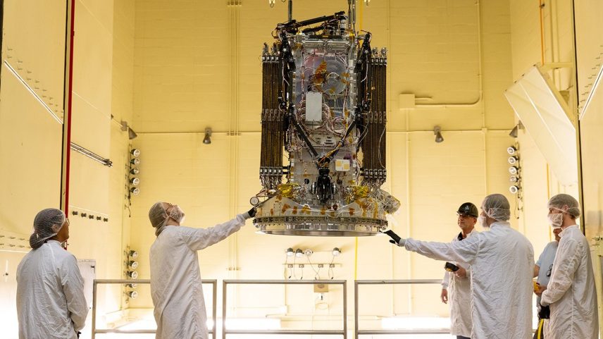 Engineers from Katalyst stabilize their LINK robotic servicing spacecraft during environmental testing at NASA’s Goddard Space Flight Center in Greenbelt, Maryland, on Wednesday, April 15, 2026. The LINK spacecraft will be encapsulated in Northrop Grumman’s Pegasus XL rocket, for launch in late June on a mission to boost the orbit of NASA’s Neil Gehrels Swift Observatory.