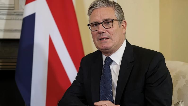 Prime Minister Keir Starmer pictures at 10 Downing Street in central London on June 14, 2026