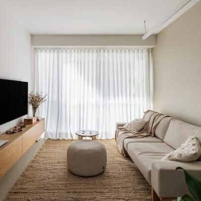 Casal de arquitetos transforma apartamento de 76 m² para morar e receber