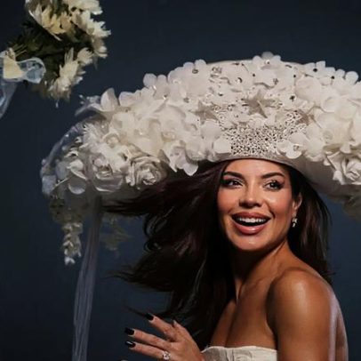 GKay usa vestido de noiva assimétrico com chapéu na festa junina de Campina Grande