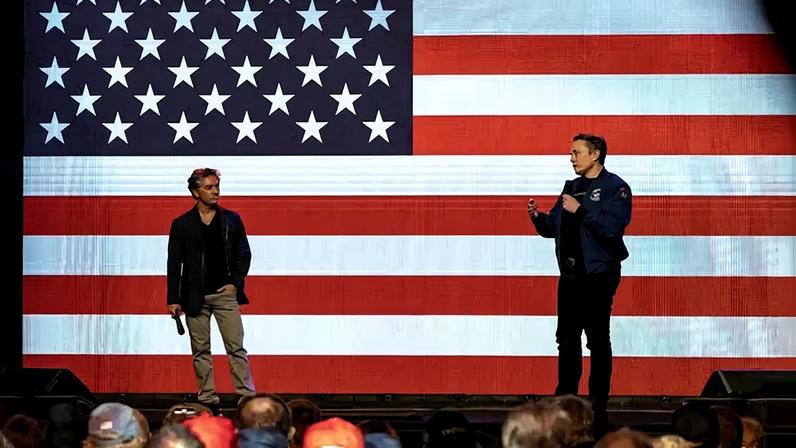 Antonio Gracias, left, and Elon Musk at a political event in Green Bay, Wis., last spring. Mr. Gracias and his private equity firm control a $65 billion stake in SpaceX.