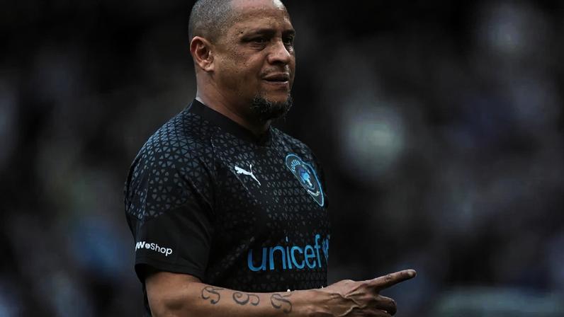 Roberto Carlos nega boatos de que está morando no CT do Real Madrid.
