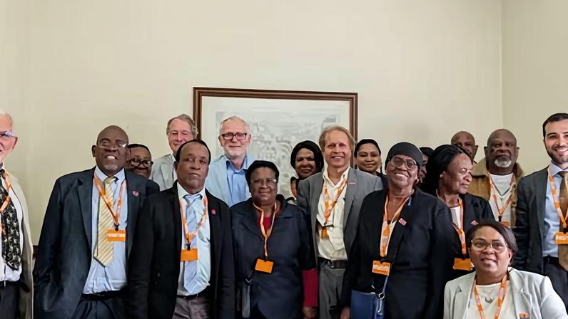 Chagossian delegation with Jeremy Corbyn (back row, centre) during a visit to the UK to urge parliamentarians to hand over sovereignty of the Chagos Islands.