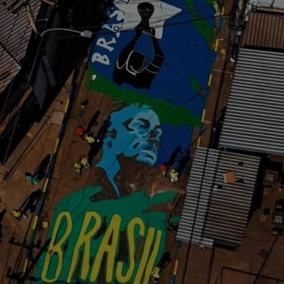 Comunidade da Penha, RJ, decora para a Copa em meio a registro de 60 corpos