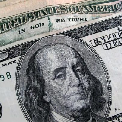 Dólar cai e Bolsa sobe com decisões de juros nos EUA e Brasil