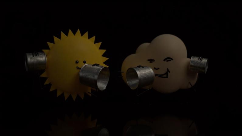 Ilustração mostra um sol amarelo e uma nuvem branca com rostos sorridentes, cada um segurando latas conectadas por um barbante, simulando uma conversa.