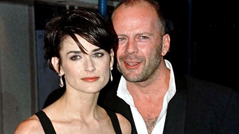 Demi Moore e Bruce Willis em evento em Los Angeles em 1997