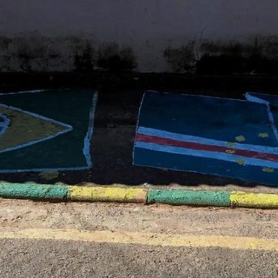 Moradores de Cabo Verde, MG, pintam rua e torcem por Cabo Verde, África