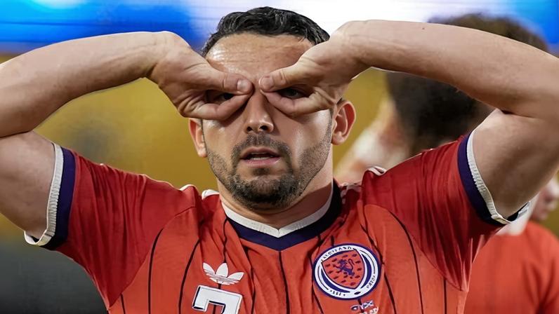 Escócia vence retorno à Copa após gol de McGinn contra o Haiti
