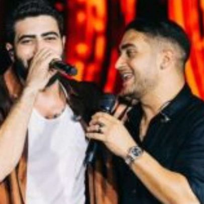 Henrique e Juliano enfrentam chuva e emocionam público em Campina Grande